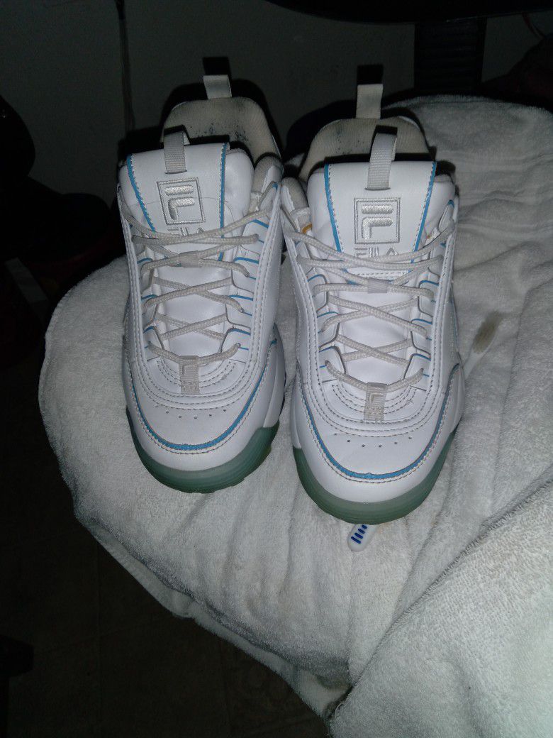 FILA SHOES WHITE AND BABY BLUE 71/2 Women's shoes Been Warn Couple Time Still In Good shape An Condition. If Someone Can Make a Offer I'm Willing take
