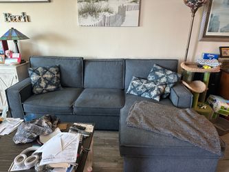 Navy blue couch with chaise - & pullout full bed and storage