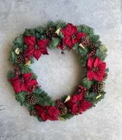 Christmas Wreath with Poinsettias and Pinecones
