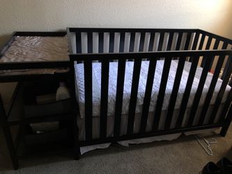 Brand new baby bed with changing table