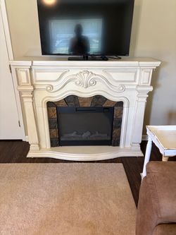 Elegant Electric Fireplace with Ornate Mantel