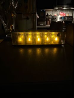 Tea light candle holder