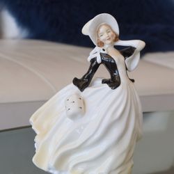 Royal Doulton “Autumn Breezes” Figurine