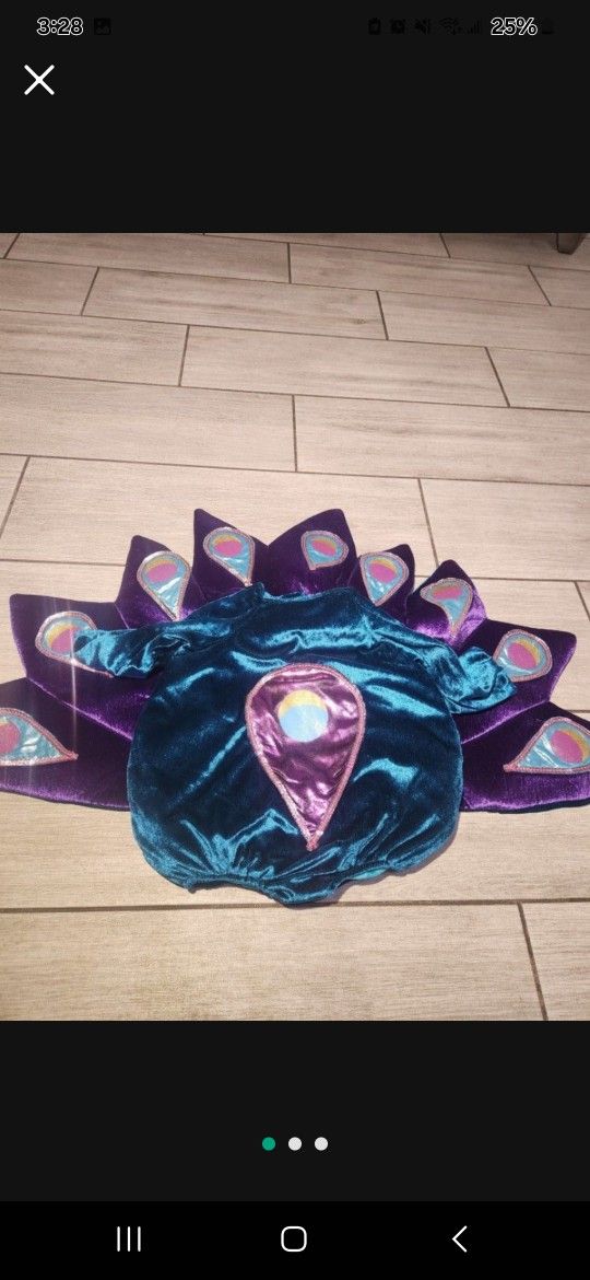 Princess paradise 6-12m peacock
costume Halloween