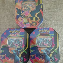 (2) Mega Charizard X Tins + (1) Mega Charizard Y Tin