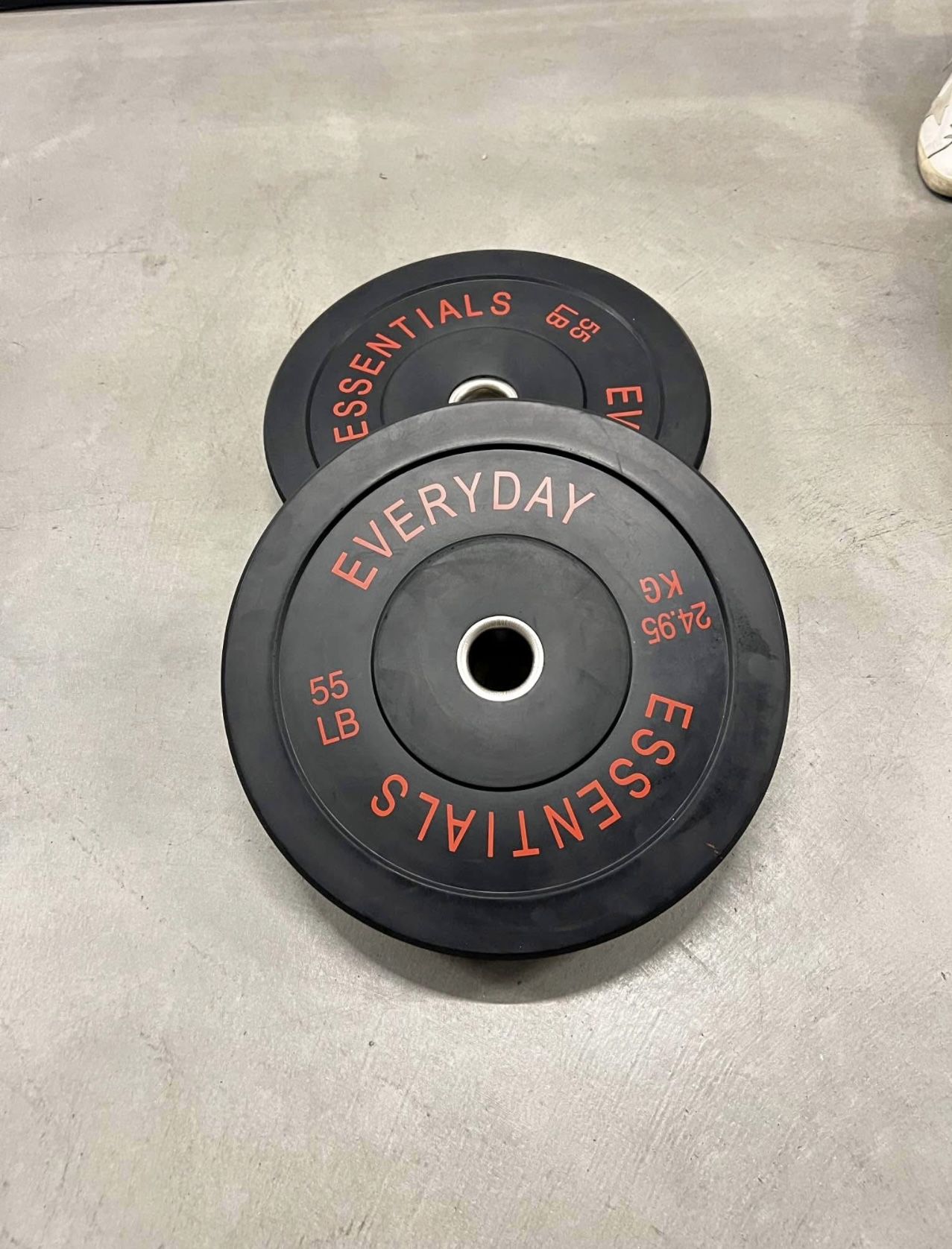 A pair of 55 bumper weights