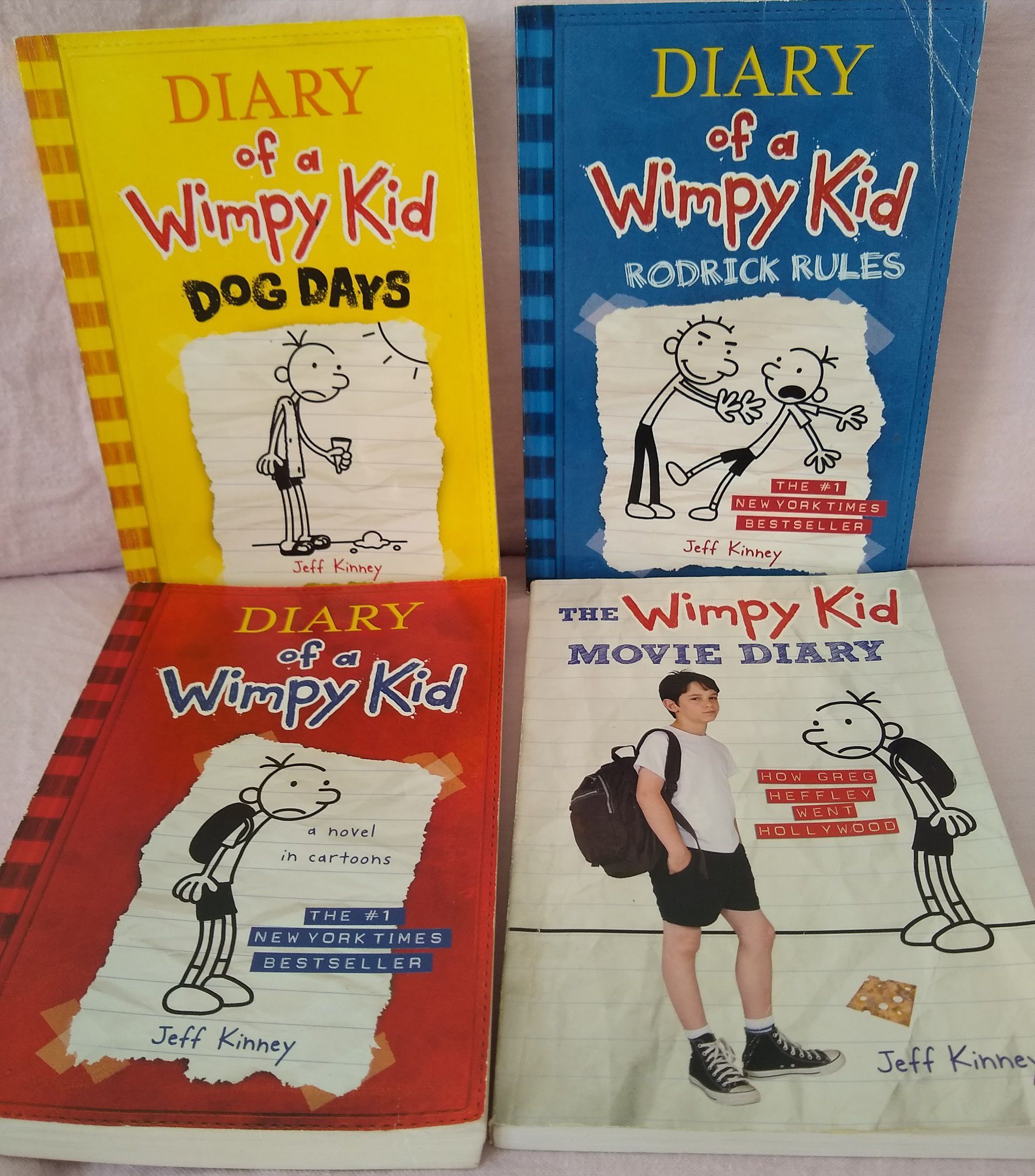 4 diary of a wimpy kid books for kid. All for $10