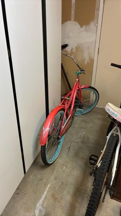 Pink huffy beach cruiser