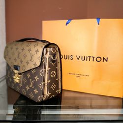 Louis Vuitton Cross-body Bag