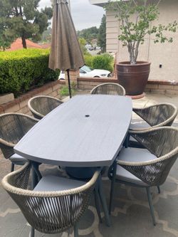 7-piece Aluminum Patio Set - Outdoor Table And 6 Woven Rope Chairs w/ Seat Cushions