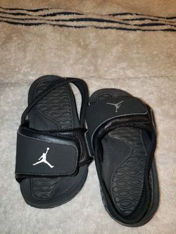 Baby black Jordan slides