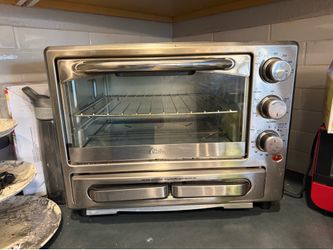 FREE OSTER TOASTER OVEN STILL WORKS