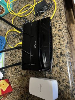 TP Link Wireless Router With Mesh Extender.