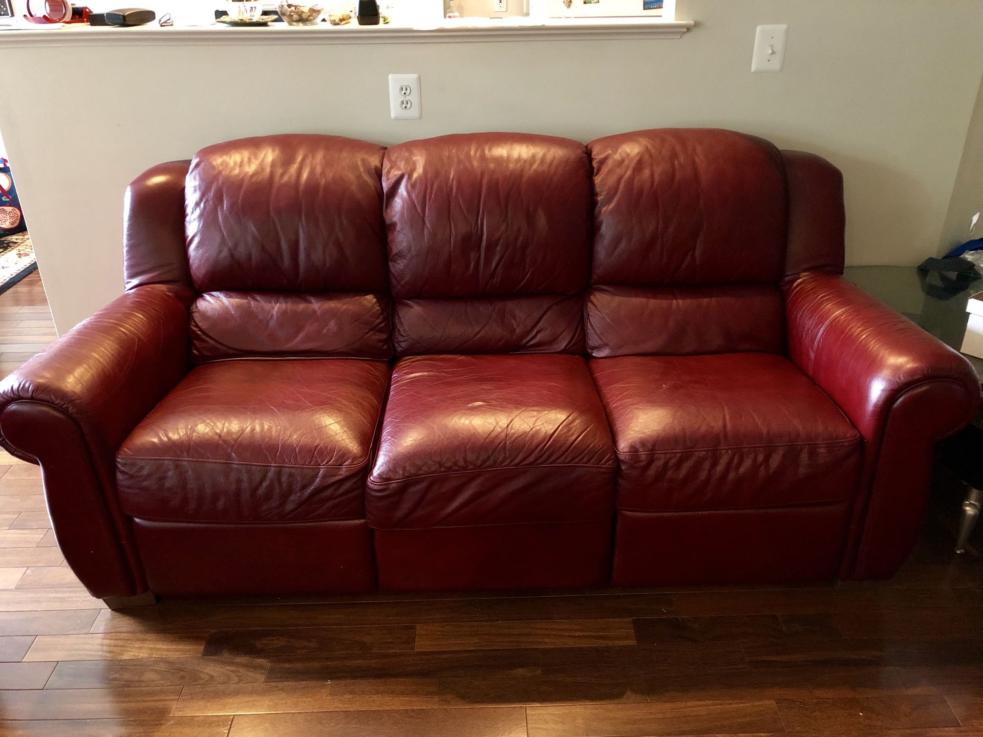 Two 3-seat Italian leather recliner sofas