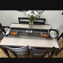 1979 Datsun/Nissan B210 Front Grille Panel with Marker Turn Signal Lights OEM