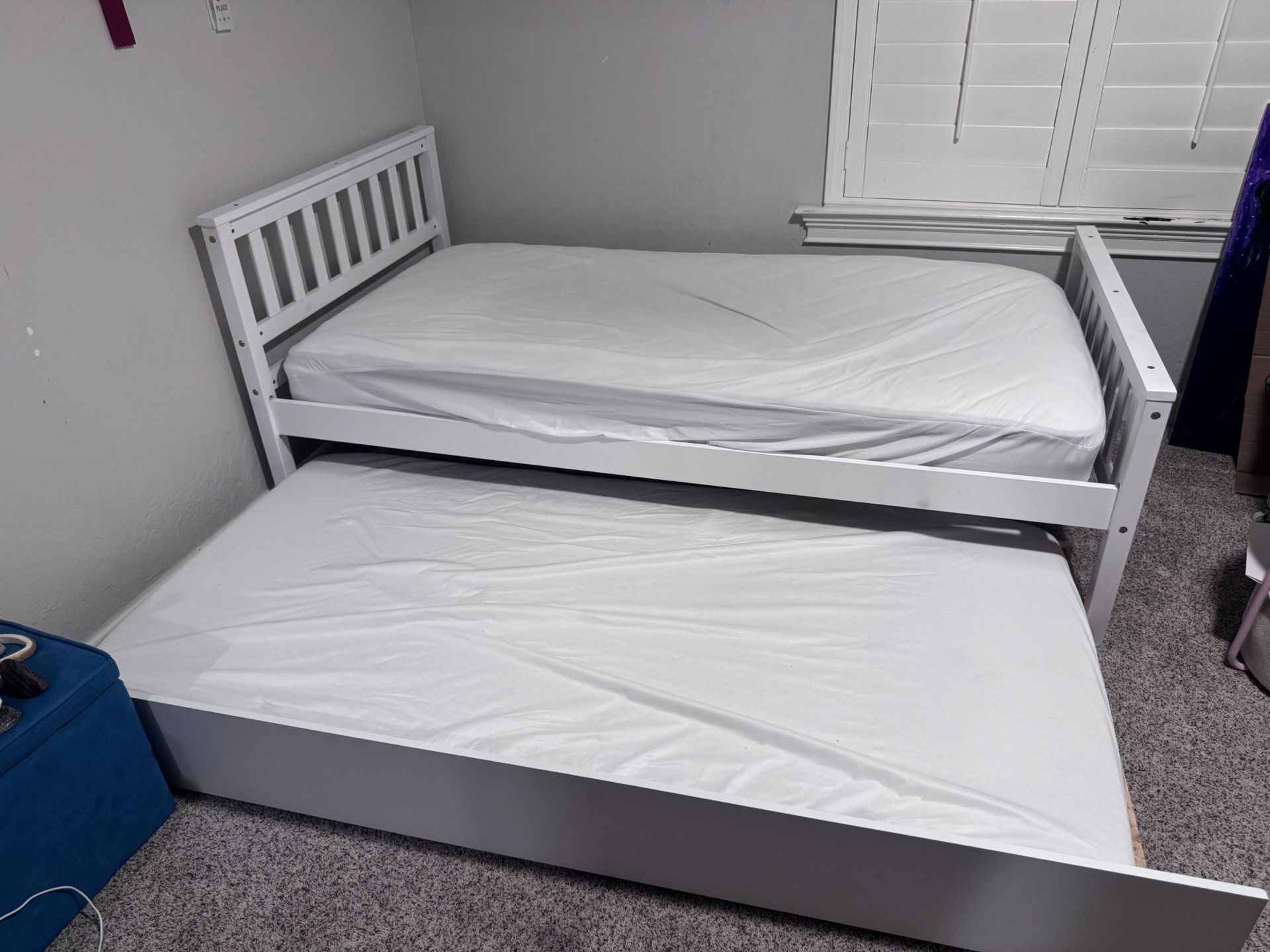 Pair of matching trundle twin beds