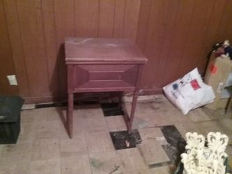 Antique sewing machine cabinet