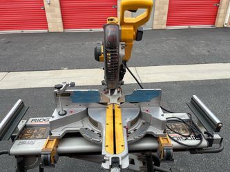 DeWalt DW718 12-in Sliding Dual Bevel Miter Saw  w/ Ridgid MS-UV Stand