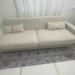 Long White And Gold Couch 