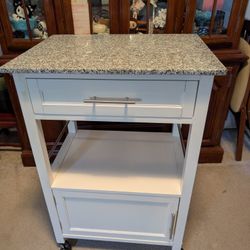 Granite Kitchen Cart With Towel Rack and 4 Wheels. Retail $200