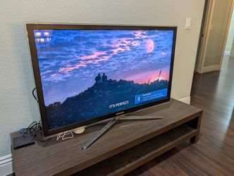 Samsung 46in UltraHD TV+ Fire TV + stand