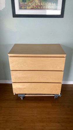 Tan, 30 1/2” tall - 31 1/8” wide, three drawer clothing dresser