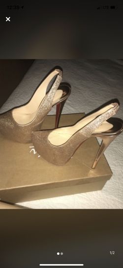 Christian Louboutin gold heels