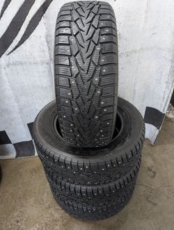 215/65r16 "Near Brand New" Nokian Nordmann 7 SUV studded winter snow tires