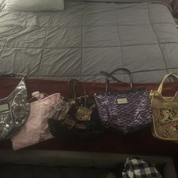 Betsy Johnson Silver Purse, Juicy Couture Authentic Brown Purse, Betsy Johnson Purple & Black Purse, And A Gold Authentic Ed Hardy Purse.