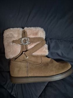 Guess Ankle fur boots they are tan and cream colored