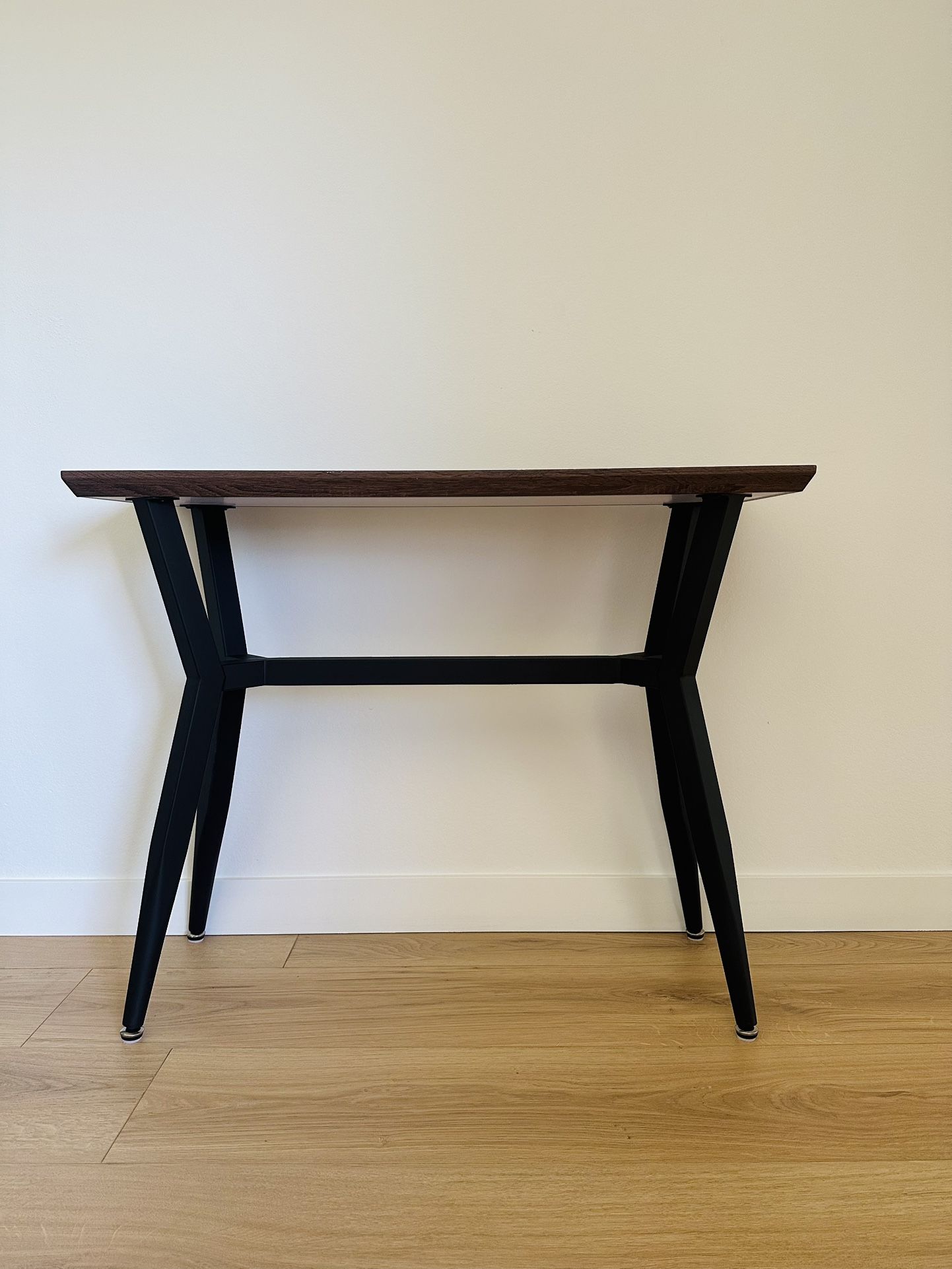 Console table with metal base