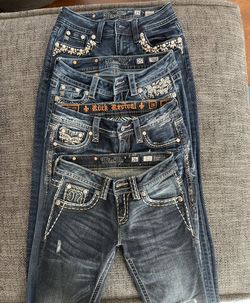 Miss Me jeans/ Rock Revival Sizes 25 & 26