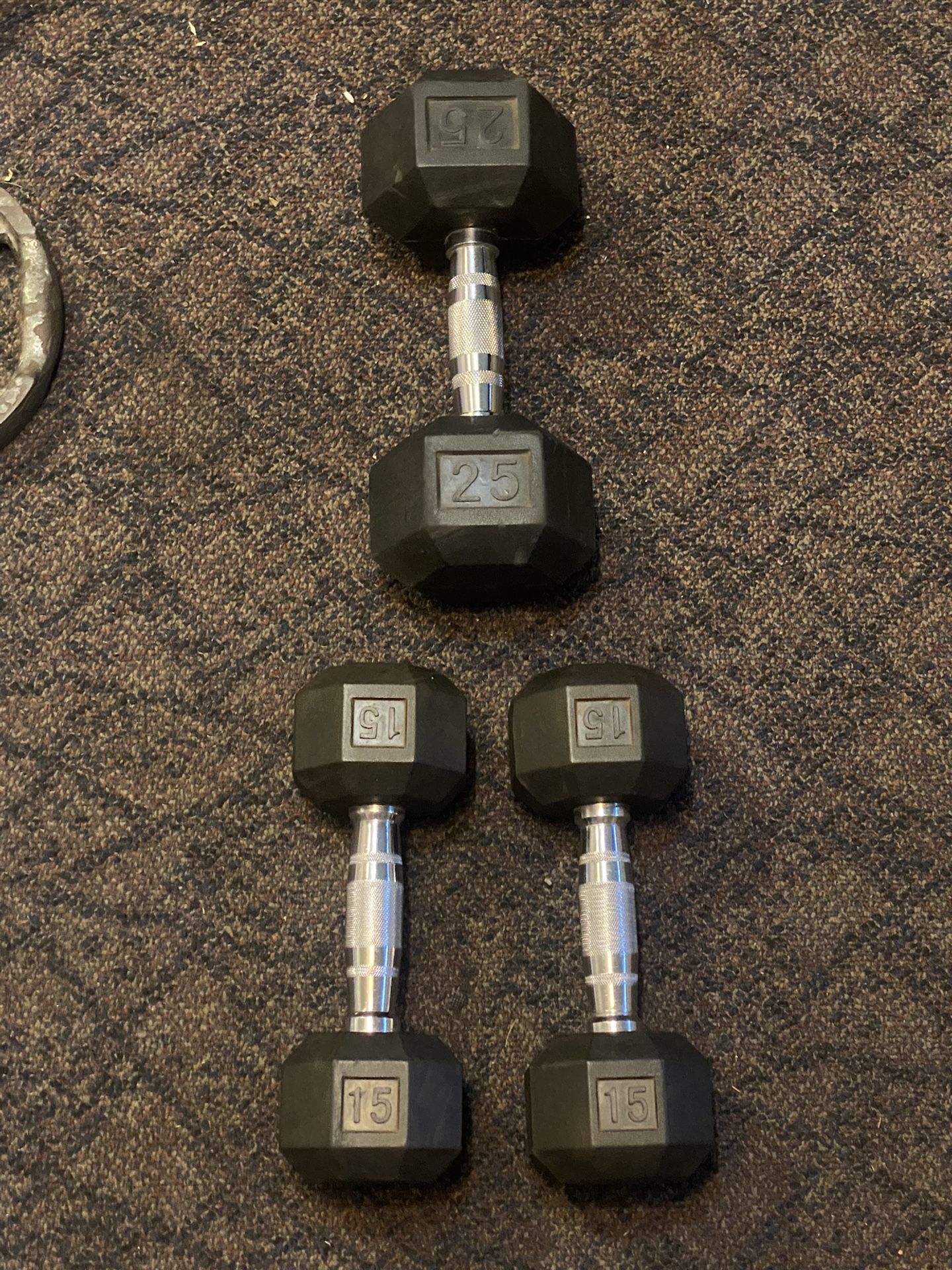 (2) 15 Lbs (1) 25 Lbs Dumbbells