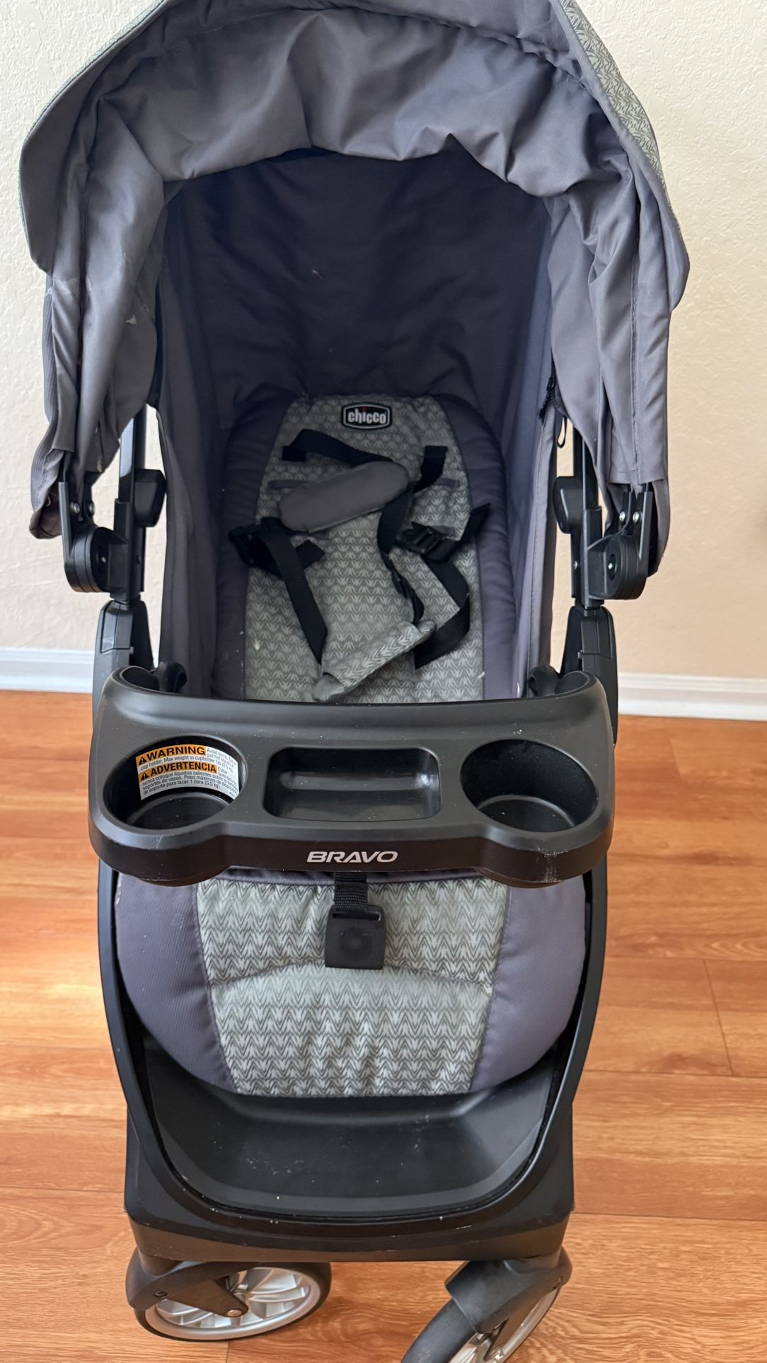 Selling Chicco Bravo in Quick Fold Trio Travel System car