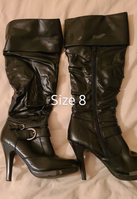 Womens tall Black dress faux leather high heels boots size 8. Heels about 3 1/2" I think. East, west, north. These do have damage here and there where