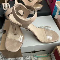 Woman’s Nude Color High Heels