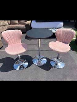 2 Pink Velvet Swivel Chairs