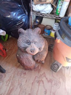 Bear statue carved out of wood
