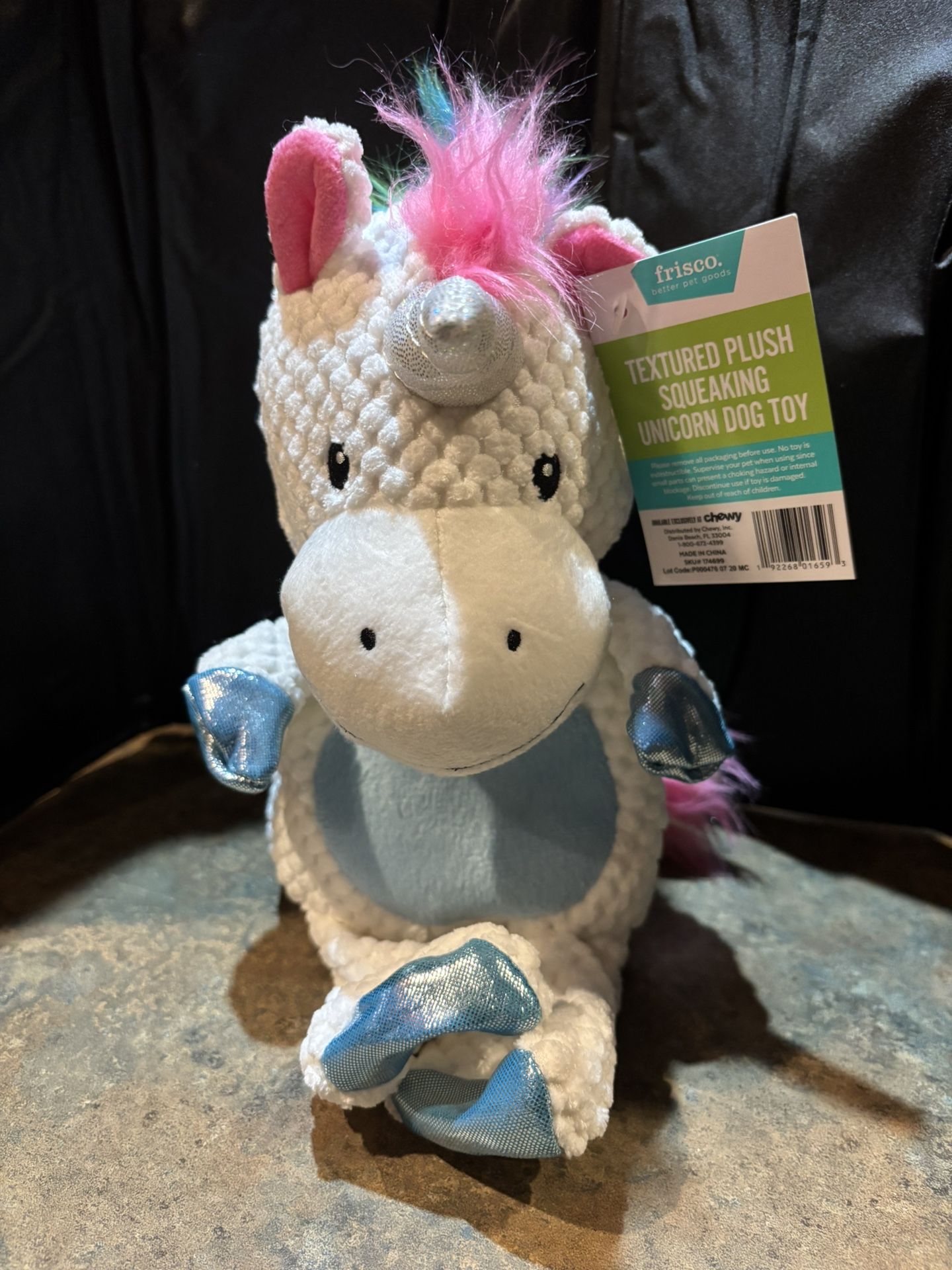 Dog Toy. Textured plush squeaking unicorn dog toy. Squeaking ball inside New.