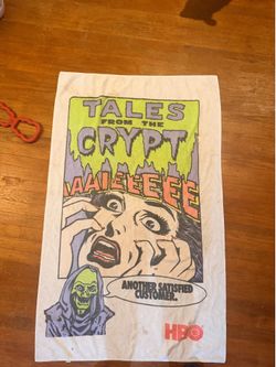 This is a very rare vintage Tales from the Crypt beach towel from 1991 features the iconic screaming woman graphic and the Cryptkeeper with his catchp