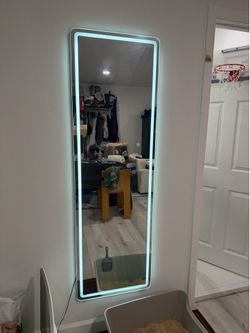 Mirrors with light