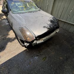 2003 g35 salvage title runs and drives buy as is or part out