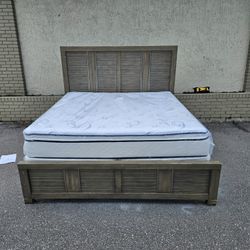 King-size Cindy Crawford's solid wood Bed Frame with Brand new king size Pillow Top Mattress and box spring in plastics