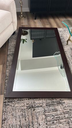 Mirror with brown frame