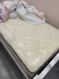 Twin bed with brand new mattress