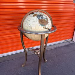 Vintage gold gilt metal three legged room standing globe/brass effect globe