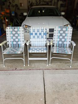 Three webbed Aluminum Chairs