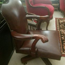 Brown Rolling Arm Chair
