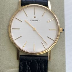 Mens Movado ,solid 14 Kt Gold Watch, Mint Condition