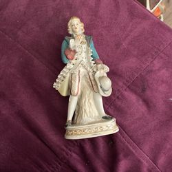 Antique porcelain figurine